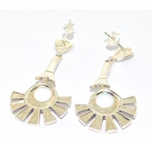 194 - Pair of silver Sunburst design fashion earrings