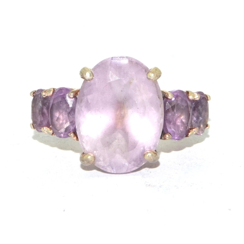 198 - 925 silver ladies Amethyst 5 stone stepped ring in an open work design size