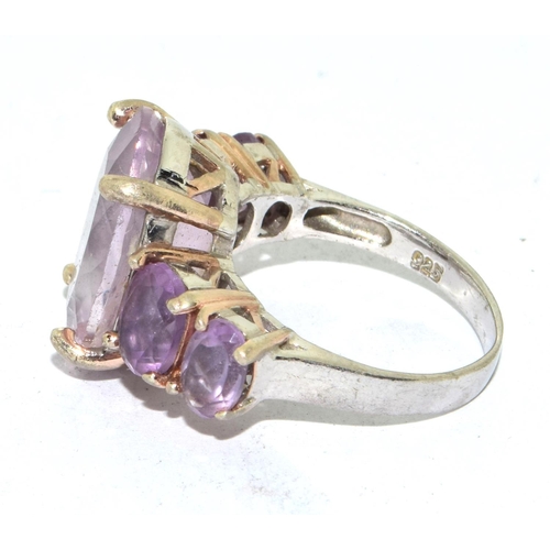 198 - 925 silver ladies Amethyst 5 stone stepped ring in an open work design size