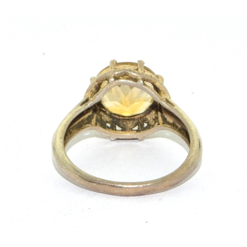 215 - 925 silver ladies vintage Amber set ring the setting is an open work castle mounting size S