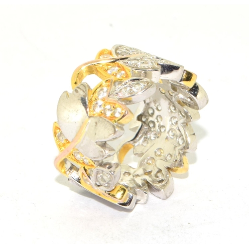 218 - 925 silver gilt  ladies leaf design ring in an eternity setting size K