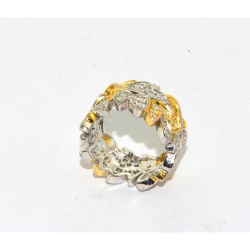 218 - 925 silver gilt  ladies leaf design ring in an eternity setting size K