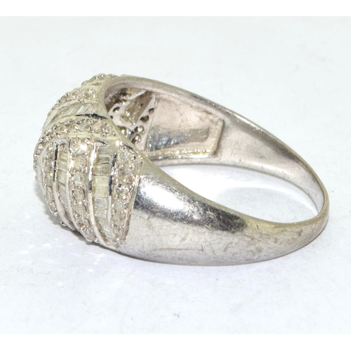 227 - 925 silver ladies vintage bulbous wave ring with baguette and round cut decoration size T