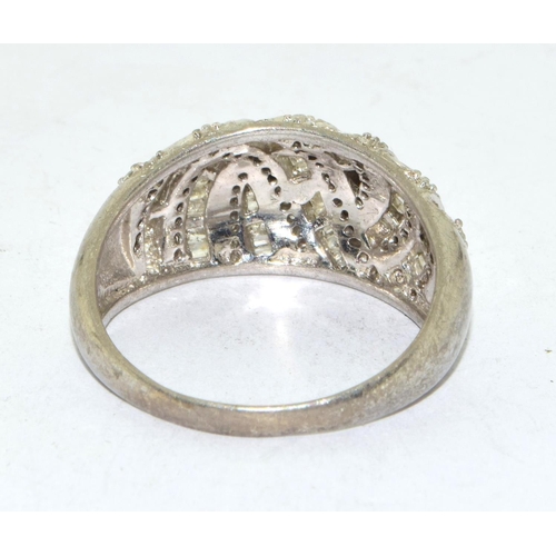 227 - 925 silver ladies vintage bulbous wave ring with baguette and round cut decoration size T