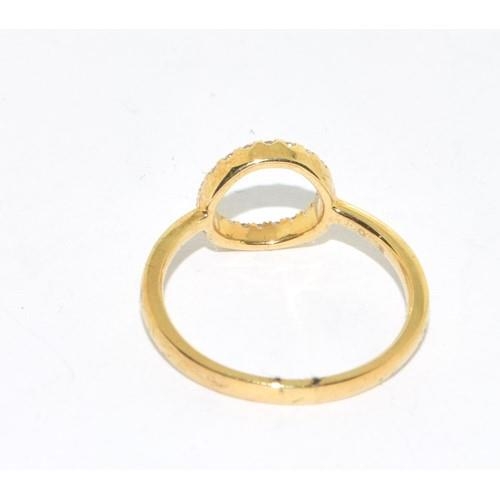 231 - 9ct gold Diamond polo design ring size M