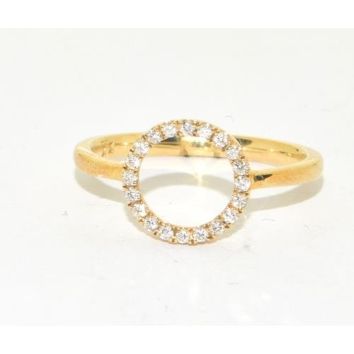 231 - 9ct gold Diamond polo design ring size M