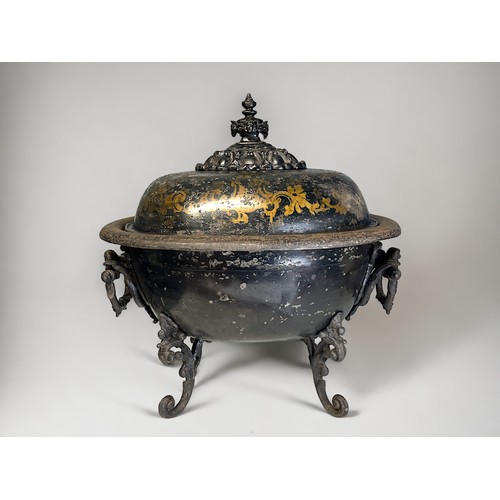 15 - A Regency Tole ware coal box.Tureen shaped, raised on cast rococo style legs. Stylised gilt painted ... 