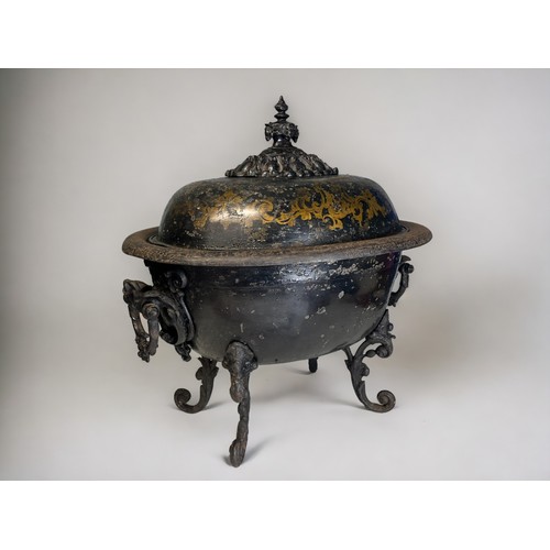 15 - A Regency Tole ware coal box.Tureen shaped, raised on cast rococo style legs. Stylised gilt painted ... 