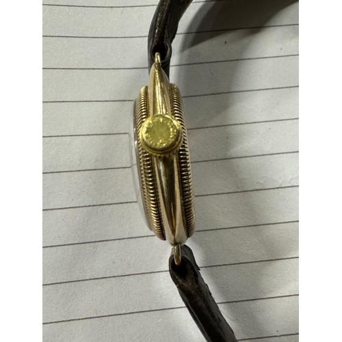 505A - 1920's 9carat gold Rolex Oyster Cushion wind wristwatch.Black roman numerals. Blue / black steel han... 