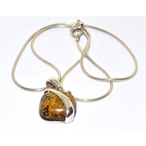 243 - A green amber 925 silver pendant