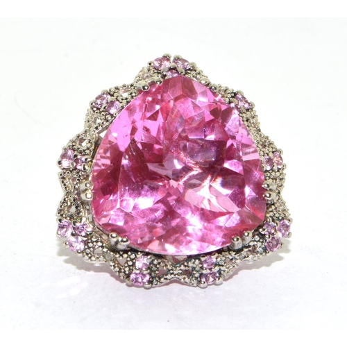 60 - Huge ladies statement or cocktail ring featuring a centre pink tourmaline coloured main stone surrou... 