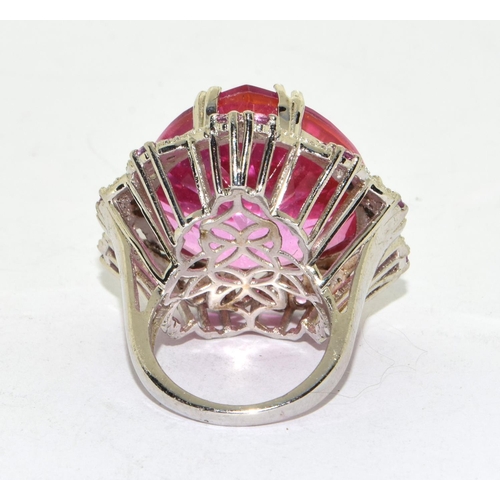 60 - Huge ladies statement or cocktail ring featuring a centre pink tourmaline coloured main stone surrou... 