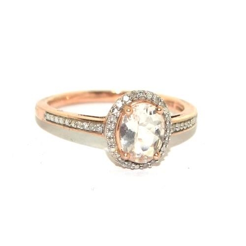 271 - 9ct gold ladies Diamond and Chrystal ring hall marked in ring as 0.1ct size Q