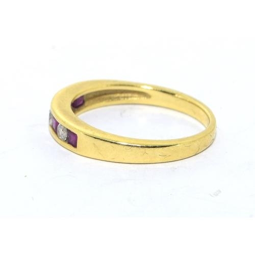 273 - 18ct gold ladies Diamond and Ruby channel set 1/2 eternity ring size L