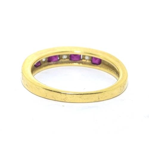 273 - 18ct gold ladies Diamond and Ruby channel set 1/2 eternity ring size L