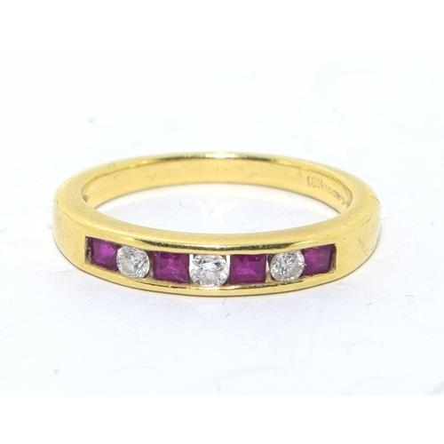 273 - 18ct gold ladies Diamond and Ruby channel set 1/2 eternity ring size L