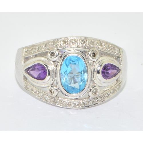 277 - 9ct white gold ladies Diamond, Amethyst and Aquamarine ring hallmarked as 0.15ct size N