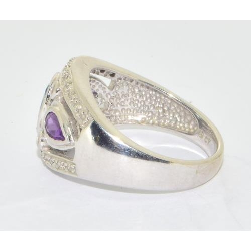 277 - 9ct white gold ladies Diamond, Amethyst and Aquamarine ring hallmarked as 0.15ct size N