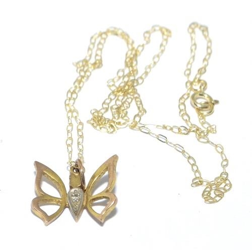 278 - 9ct gold Butterfly pendant necklace set with Diamonds on a 40cm chain