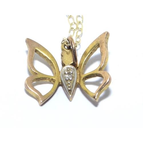 278 - 9ct gold Butterfly pendant necklace set with Diamonds on a 40cm chain