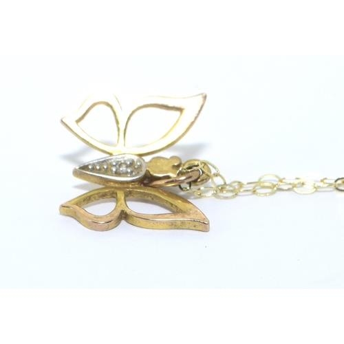 278 - 9ct gold Butterfly pendant necklace set with Diamonds on a 40cm chain