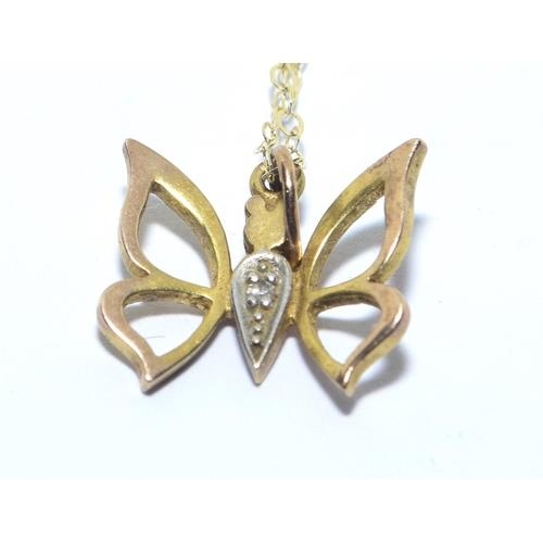 278 - 9ct gold Butterfly pendant necklace set with Diamonds on a 40cm chain