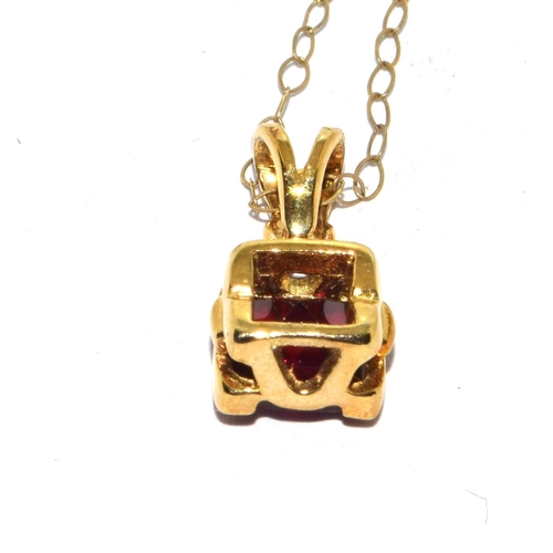 294 - 9ct gold checker cut Garnet pendant necklace on a 44cm gold chain 