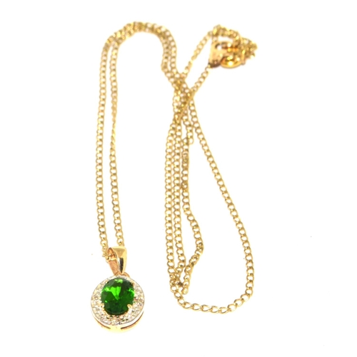 296 - 9ct gold Diamond and Diopsite pendant necklace on a 46cm gold chain 