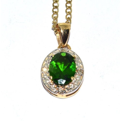 296 - 9ct gold Diamond and Diopsite pendant necklace on a 46cm gold chain 