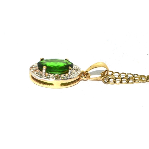 296 - 9ct gold Diamond and Diopsite pendant necklace on a 46cm gold chain 