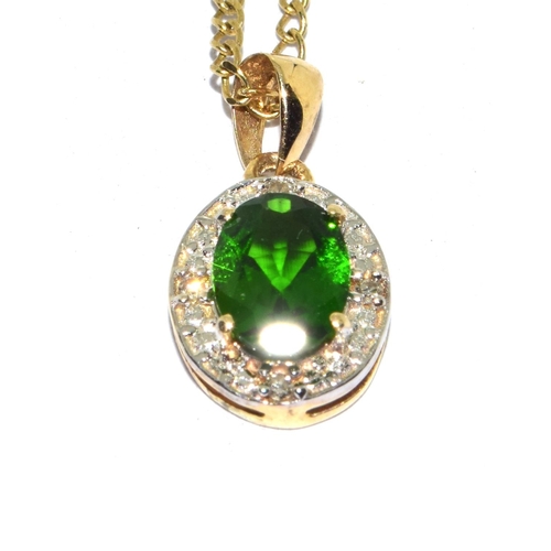 296 - 9ct gold Diamond and Diopsite pendant necklace on a 46cm gold chain 