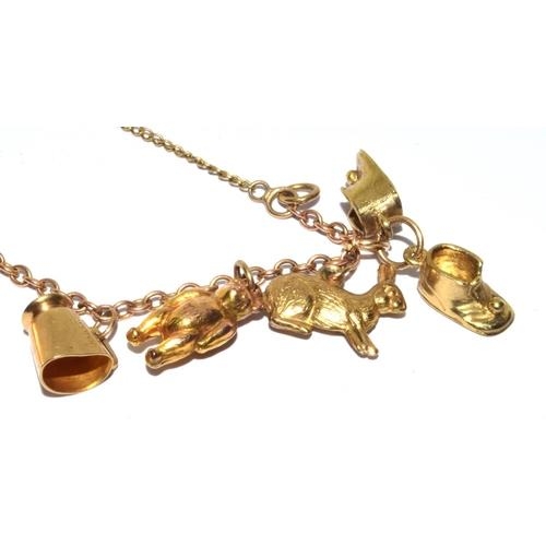 314 - 9ct gold charm bracelet with heart padlock and safety chain together with 8 charms 10.5g