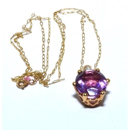 351 - 9ct gold Diamond and Amethyst pendant necklace chain is 44cm