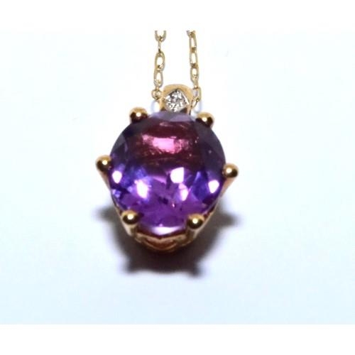 351 - 9ct gold Diamond and Amethyst pendant necklace chain is 44cm