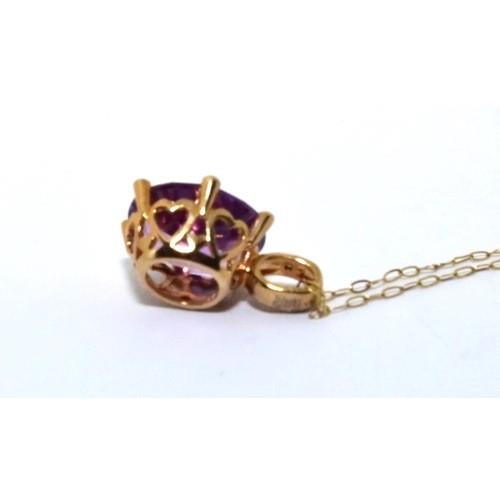 351 - 9ct gold Diamond and Amethyst pendant necklace chain is 44cm