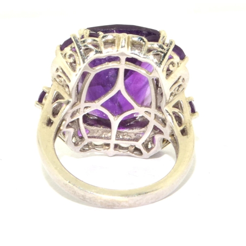 264 - 925 silver ladies Amethyst oblong Halo design statement ring with Amethyst to the perimeter size N