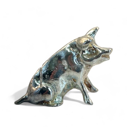 69 - A boxed set of six white metal 'Pig' place card holders.20 x 30mm