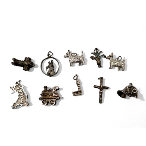 77 - Ten sterling silver Charms.