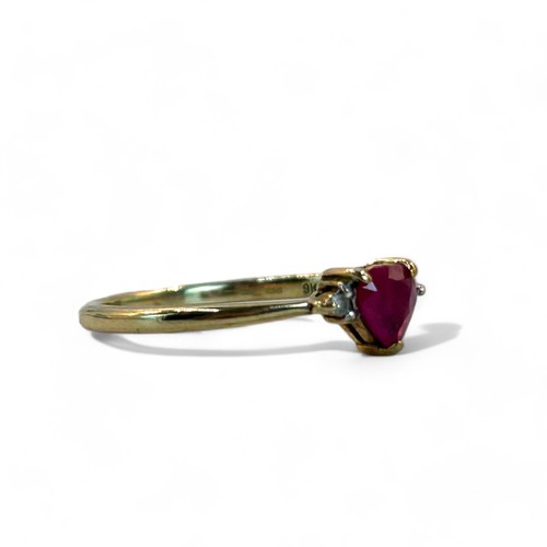 226 - 9ct Gold heart shape gemstone ring.Accented with diamonds to shoulders. Size - P.