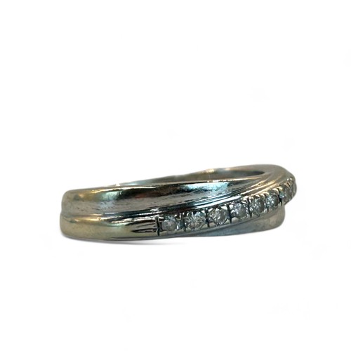 234 - 9ct white Gold & Diamond cross over eternity ring.Size J/K.Weight - 2.4g