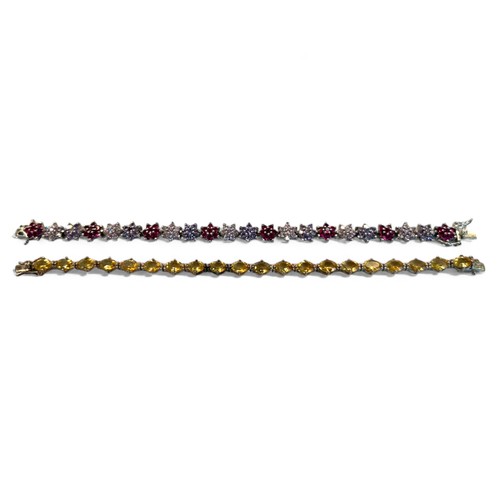 238 - Two Silver ladies bracelets.One set with multicolour CZ's if floral setting.Length - 19.5cm... 