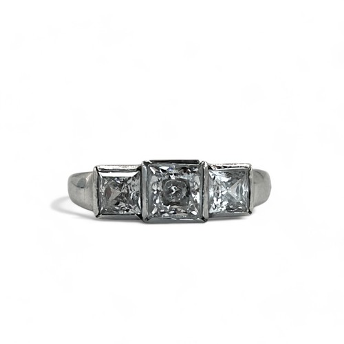 245 - A 9ct white Gold trilogy ring.Set with three square cut CZ's.Size - MWeight - 3g