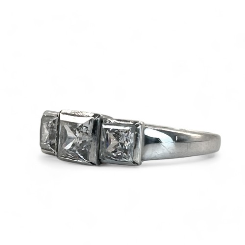 245 - A 9ct white Gold trilogy ring.Set with three square cut CZ's.Size - MWeight - 3g