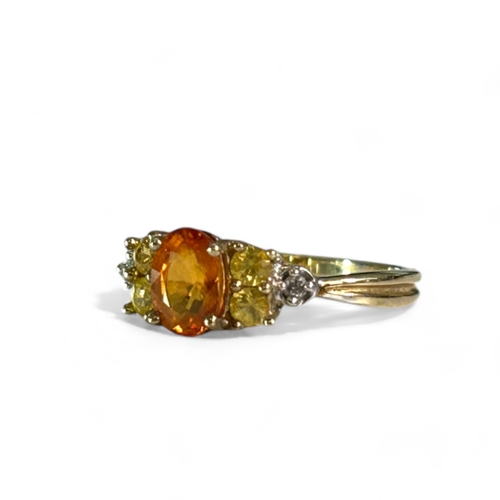 251 - A 9ct Gold, orange Sapphire and Diamonds ring.Size - MWeight - 1.9g