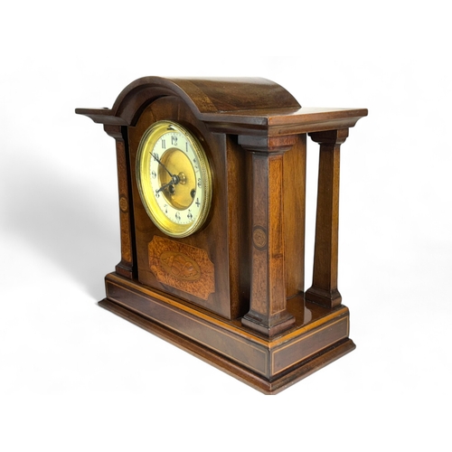 254 - A French Jules-Rolez mantle clock.Late 19th-20th century.Mahogany & Burr Walnut inlaid with Shel... 