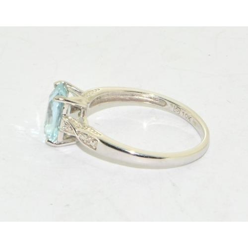 281 - 18ct white gold Aquamarine and Diamond ring size N