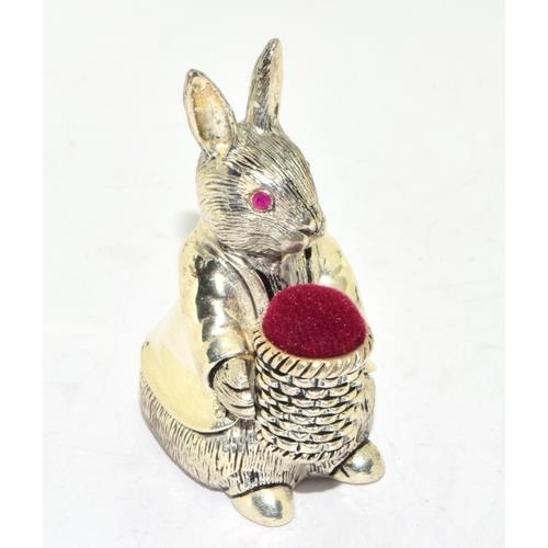 285 - Unusual silver plate pincushion in the form of peter Rabbit