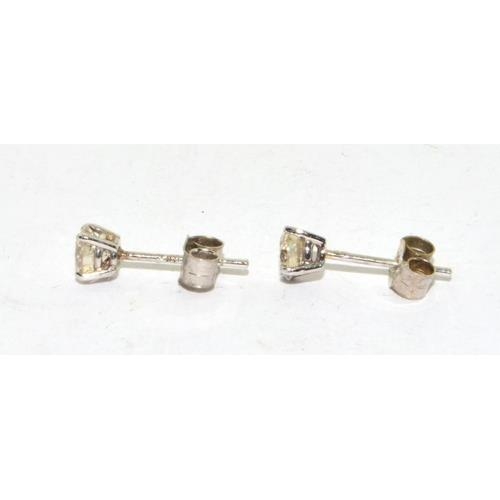 80 - Pair 14ct white gold Diamond stud earrings approx 70 points