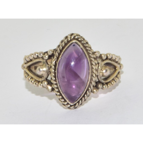 303 - 925 silver ladies cabochon diamond shape amethyst ring set on a twin shank design setting size S