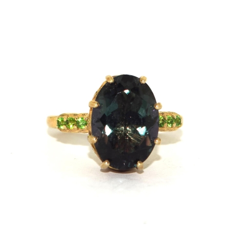 307 - 925 silver gilt large Semi precious stone  deigned ring with matching  stones to the shank... 